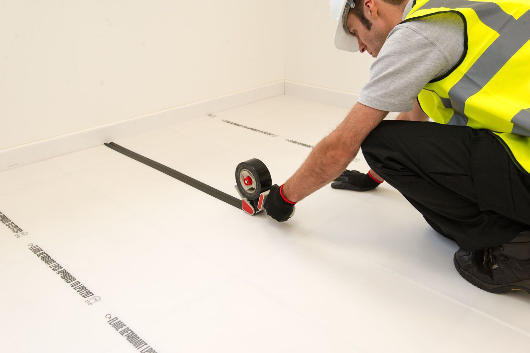 Builder using Correx floor protection
