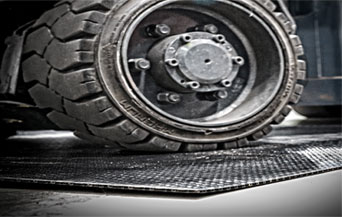 Heavy wheel on protective cover - Floor protection